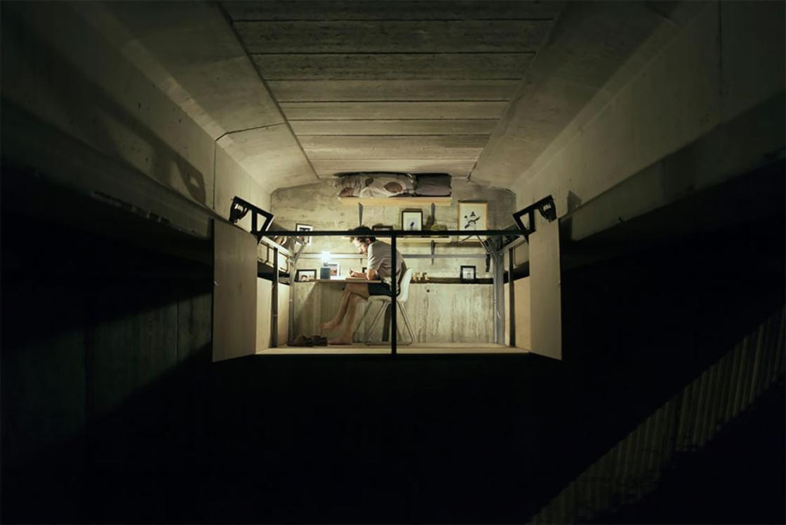 This designer built an apartment hidden under a bridge
