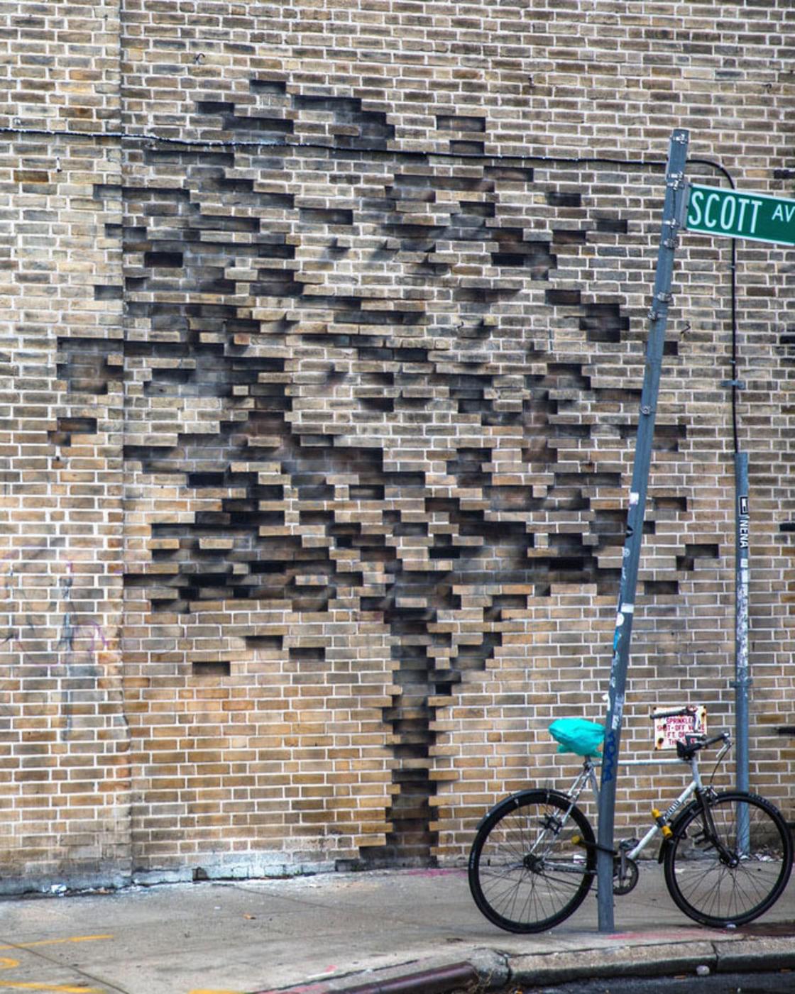Pejac unveils two stunning optical illusions in the streets of New York