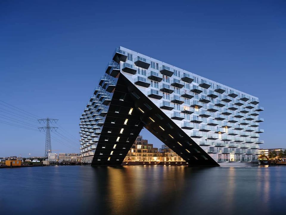 Architects Design Building With Apartments Floating Over Water Like the Bow of a Ship