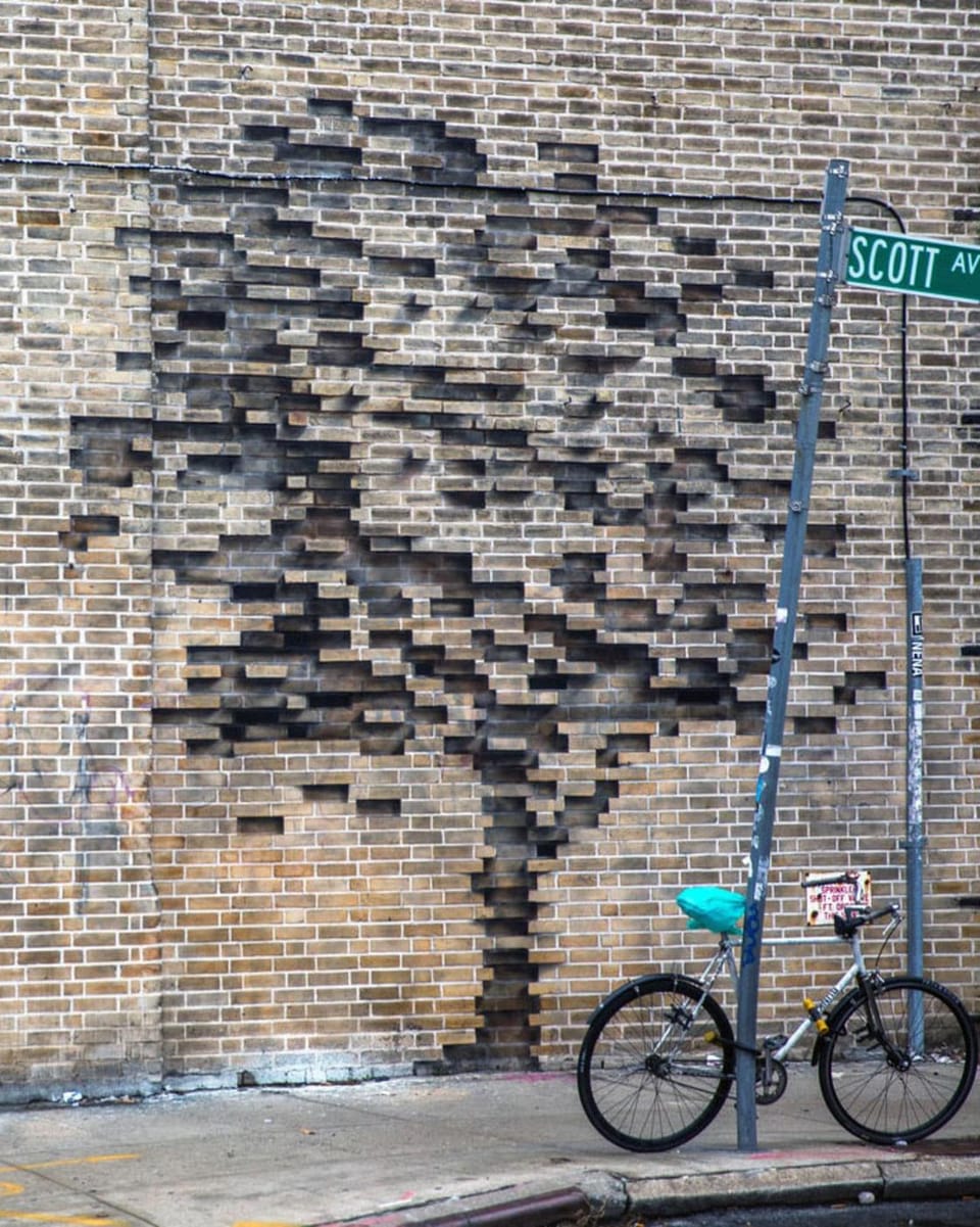 Pejac unveils two stunning optical illusions in the streets of New York